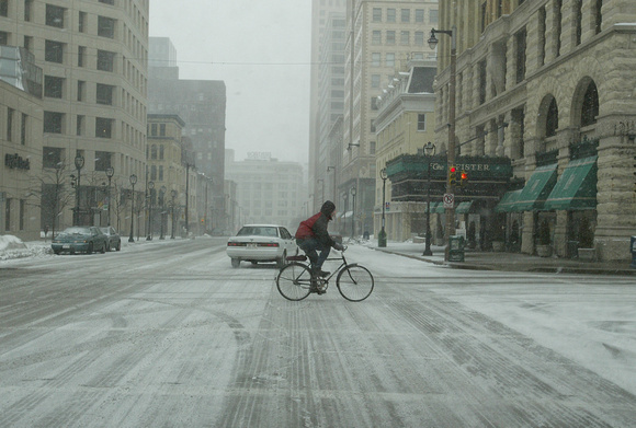 city snow bike rider